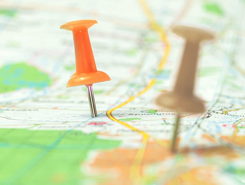 A pin marking a location on a road map